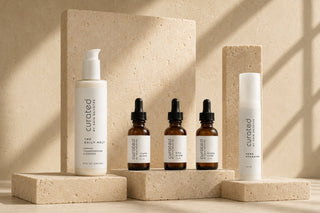 Curated By Skin Devotee product set featuring Hero Hydrator moisturizer, Vita Glow serum, Hydra Cure serum, youth Elixir serum and The Daily Melt creamy cleanser.