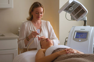 Woman receiving a customized treatment from Joanna at Skin Devotee Facial Studio in Philadelphia.