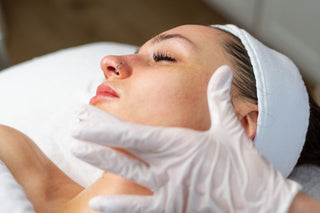 Woman getting ready to receive a professional microchanneling treatment for acne scars and texture in Philadelphia