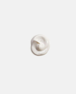 Close-up swatch of Curated by Skin Devotee The Daily Melt Creamy Cleanser showing its rich, smooth, creamy texture.